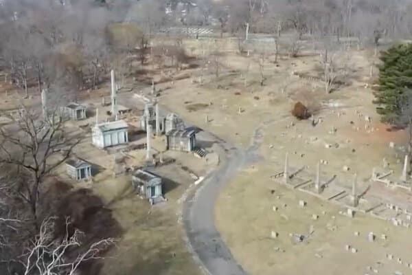 Police tape and cemetery scene where skeletons were allegedly stolen in Pennsylvania