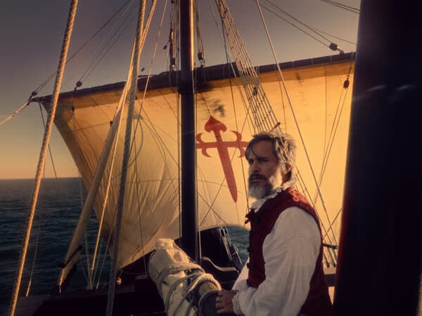 A scene from the film 'Magellan' depicting the explorer on a ship.