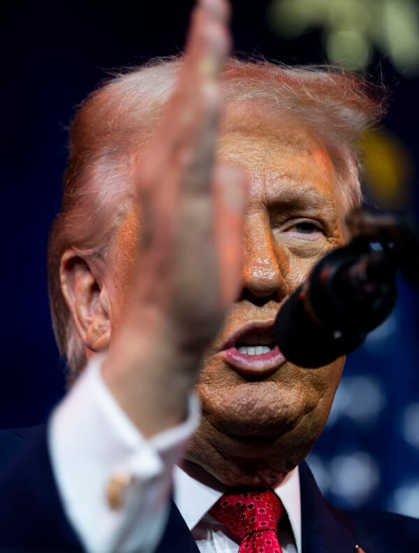 A political graphic depicting the US Capitol dome superimposed over a map of Venezuela, illustrating the geopolitical tension between the two nations in 2026.