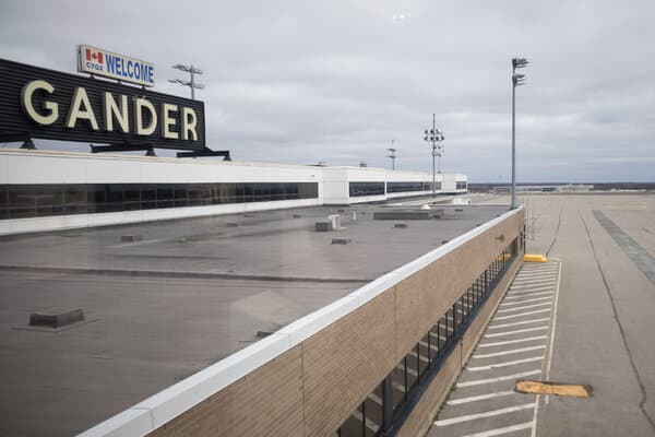 Volunteers in Gander, Newfoundland, assisting stranded passengers in a community center