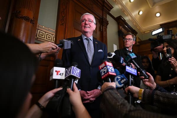 Students in a classroom setting without phones
