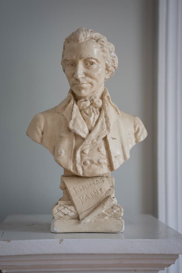 An oil painting of Thomas Paine, a radical thinker and author of Common Sense, with a determined expression.